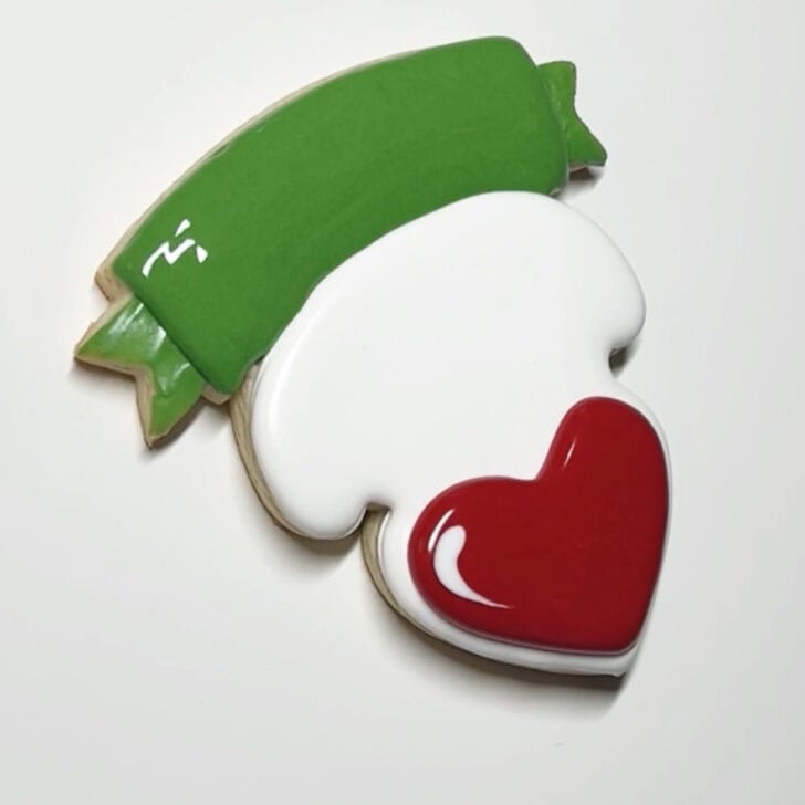 how to decorate teaching is a work of heart cookies with royal icing