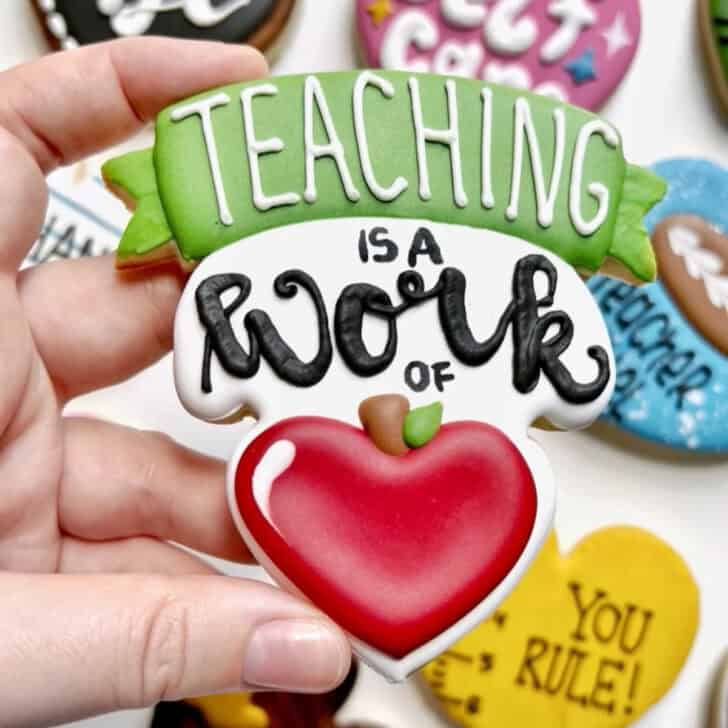 teaching is a work of heart cookies with royal icing