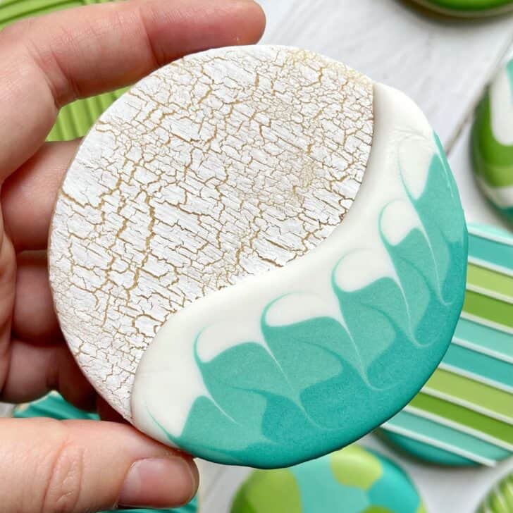 crackle effect on sugar cookie decorated with royal icing 