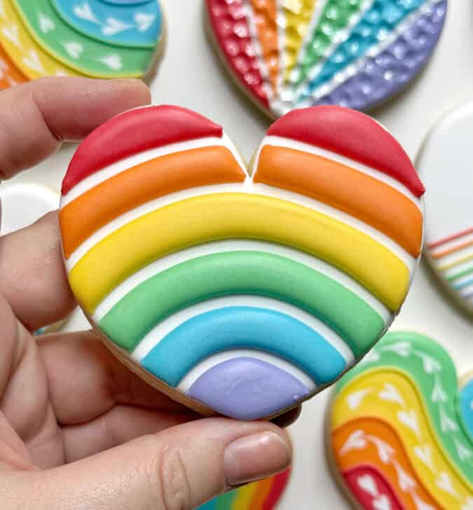 rainbow heart cookie decorated with royal icing