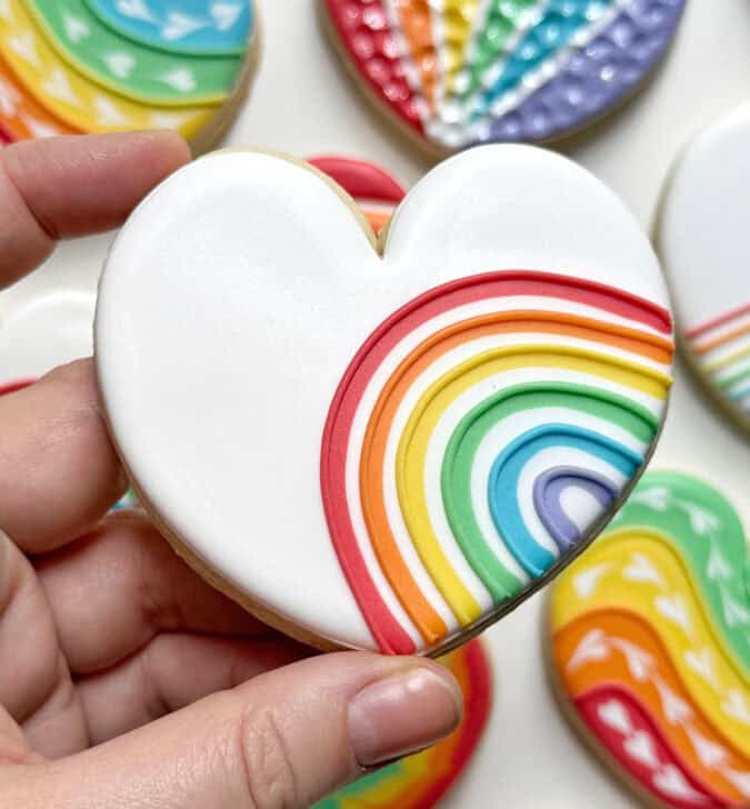 rainbow heart cookie decorated with royal icing
