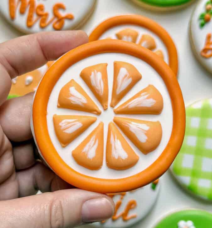 orange slice cookie decorate with royal icing