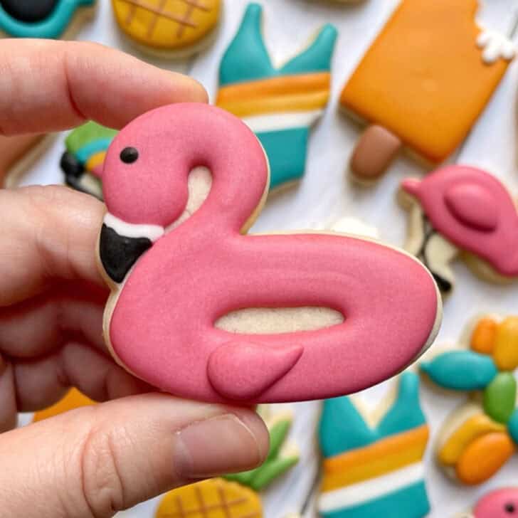 Flamingo pool float cookies decorated with royal icing