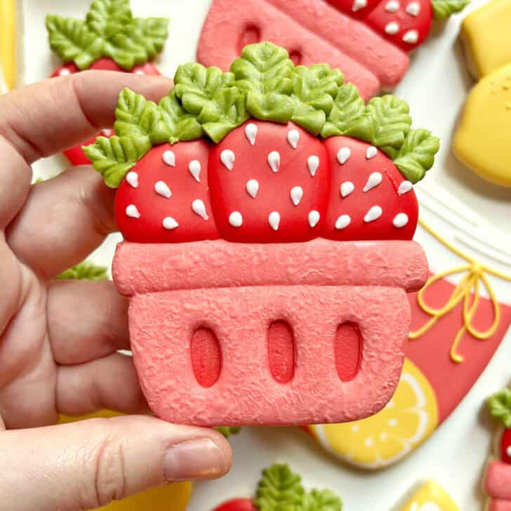 example of royal icing leaves piped with a tipless piping bag