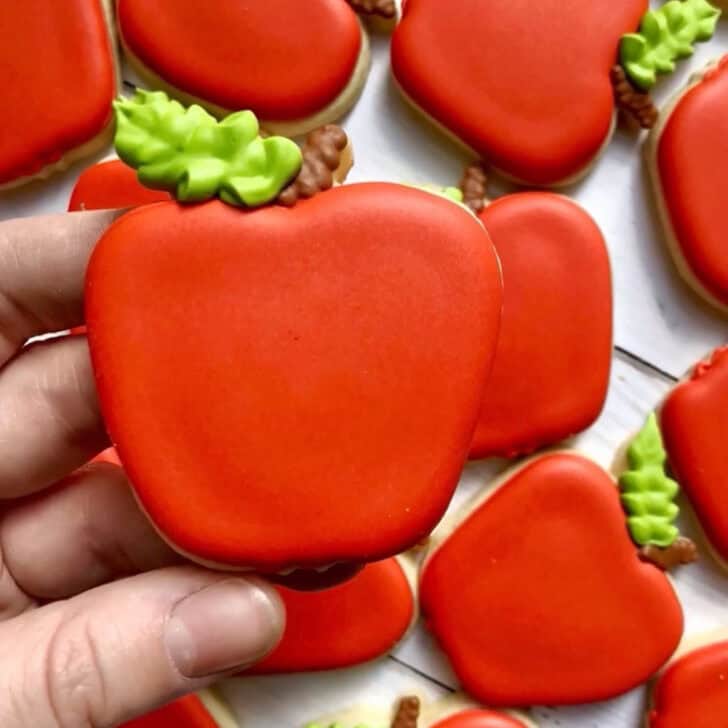 apple cut out cookies decorated with royal icing