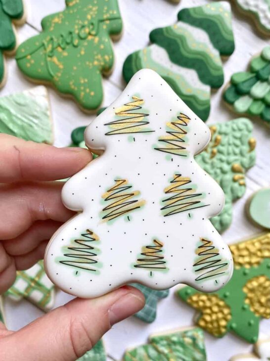 wet on wet Christmas tree cookies decorated with royal icing