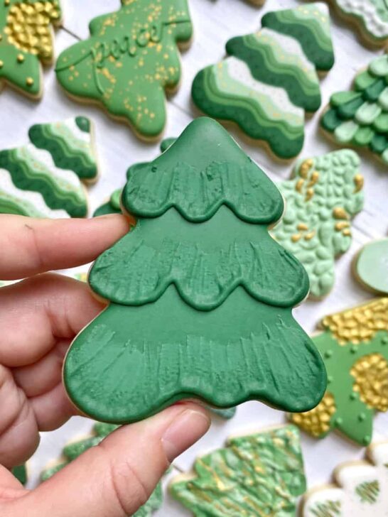 brush embroidery Christmas tree cookies decorated with royal icing