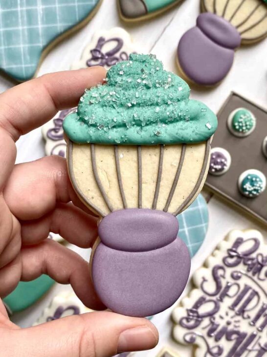 whisk cookies decorated with oil icing