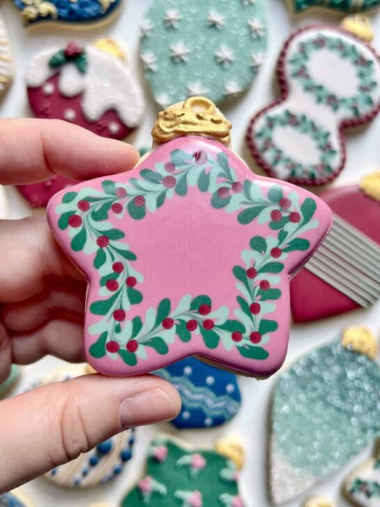 pink ornament cookies decorated with royal icing for christmas 