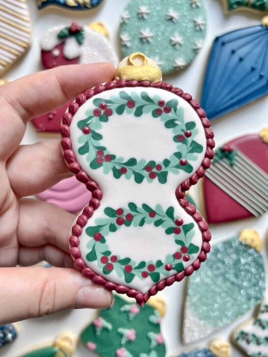 white ornament cookies decorated with royal icing for christmas 