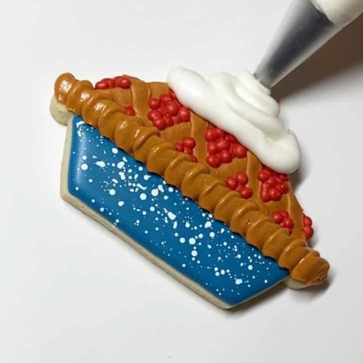 Step by step decorating instructions for how to decorate cherry pie sugar cookies for realizing