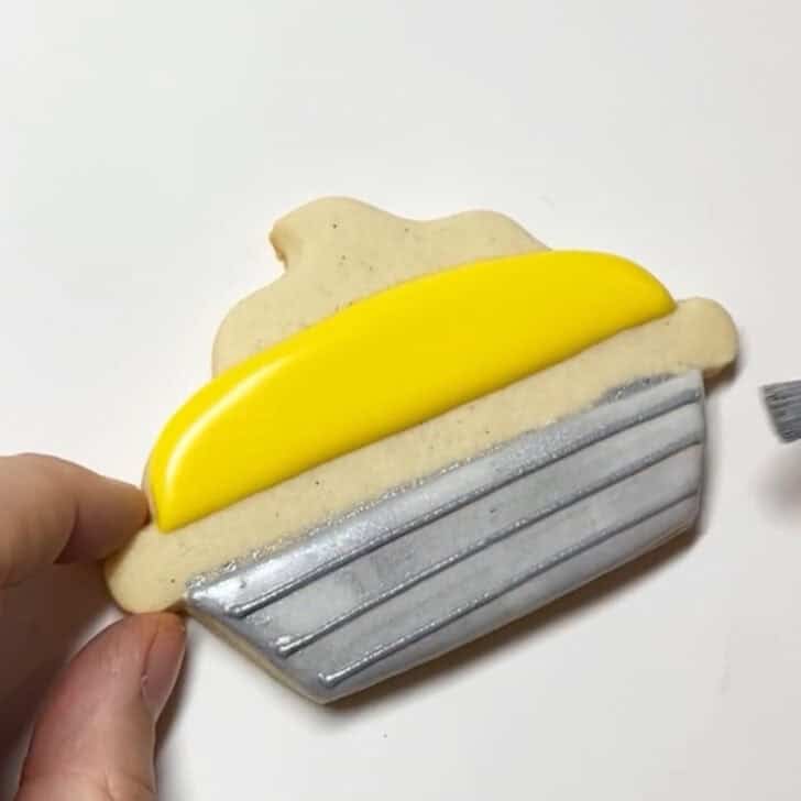 Step-by-step decorating instructions for how to decorate lemon pie cookies with royal icing