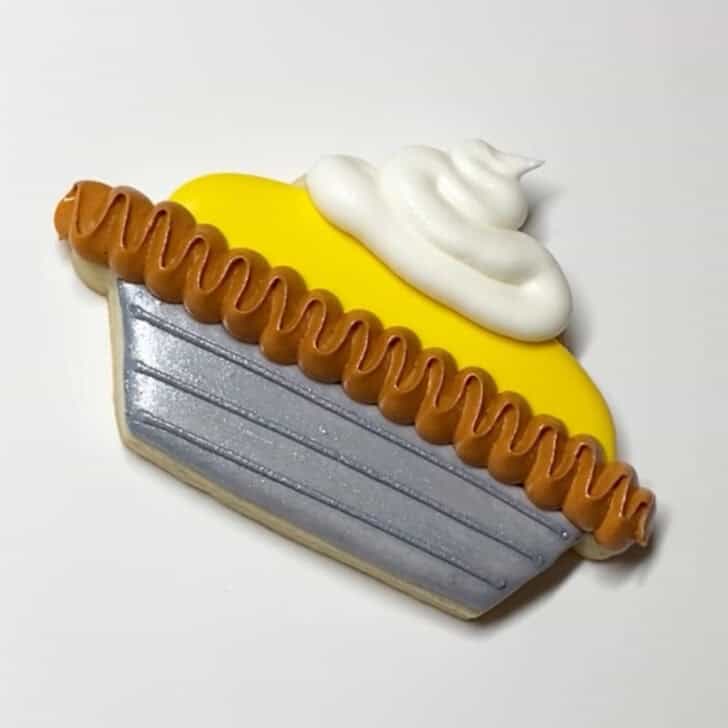 Step-by-step decorating instructions for how to decorate lemon pie cookies with royal icing