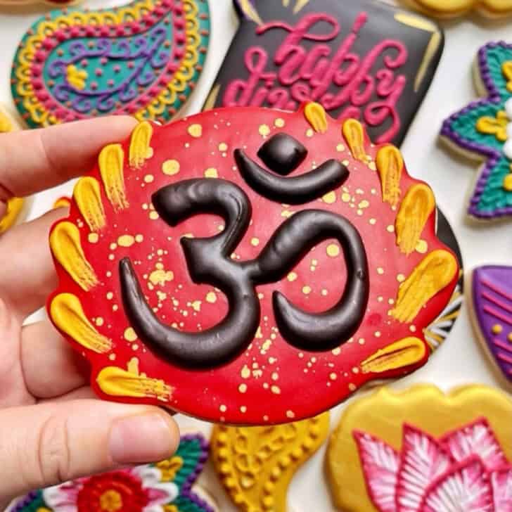 om cookies decorated with royal icing