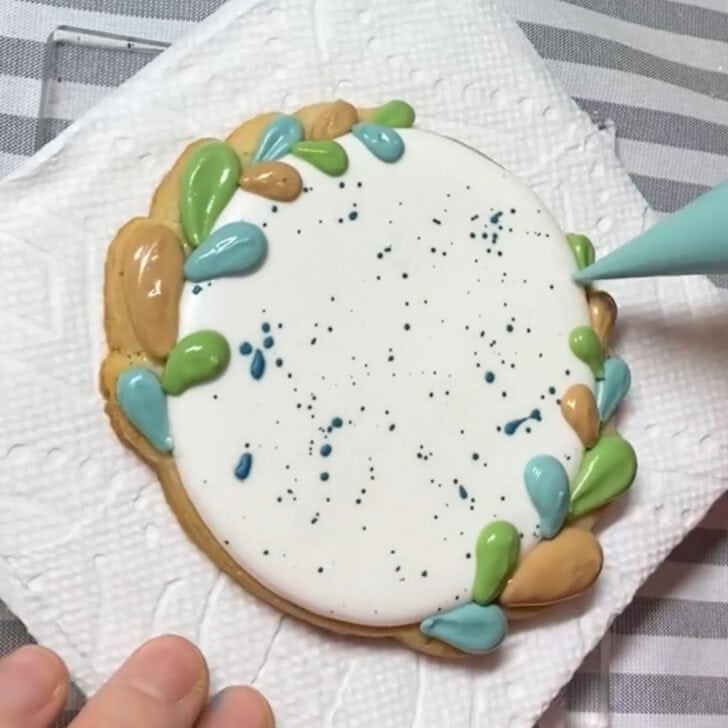 Step-by-step decorating instructions for how to decorate place card cookies with royal icing