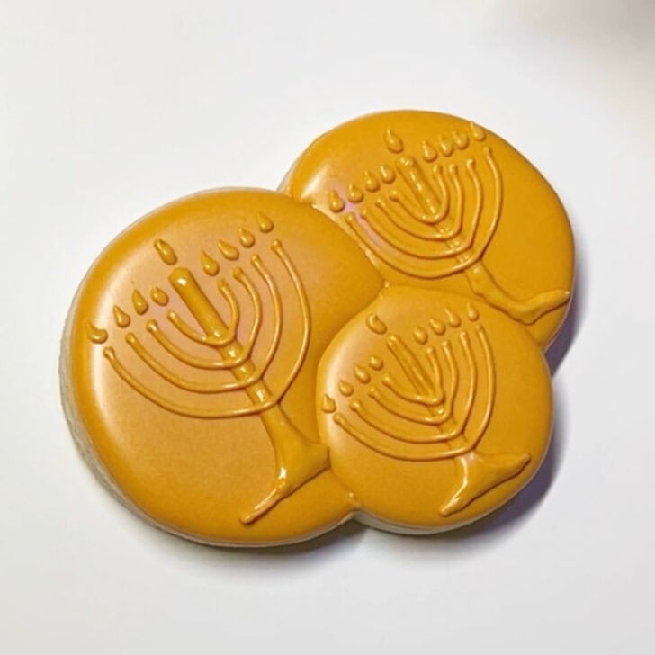Step-by-step decorating instructions for how to decorate Hanukkah gelt cookies with royal icing