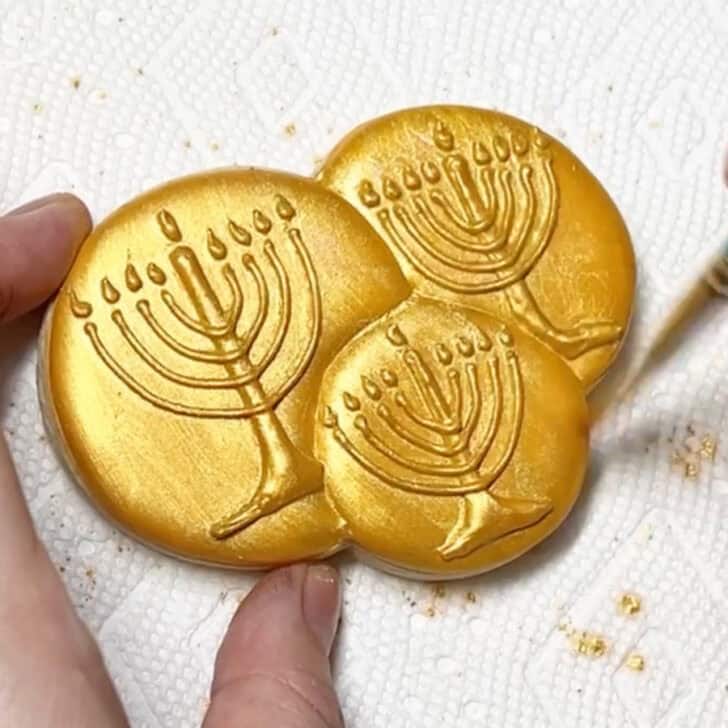 Step-by-step decorating instructions for how to decorate Hanukkah gelt cookies with royal icing