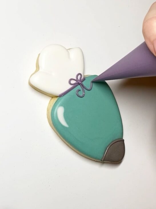 Step-by-step decorating instructions for how to decorate piping bag cookies with royal icing