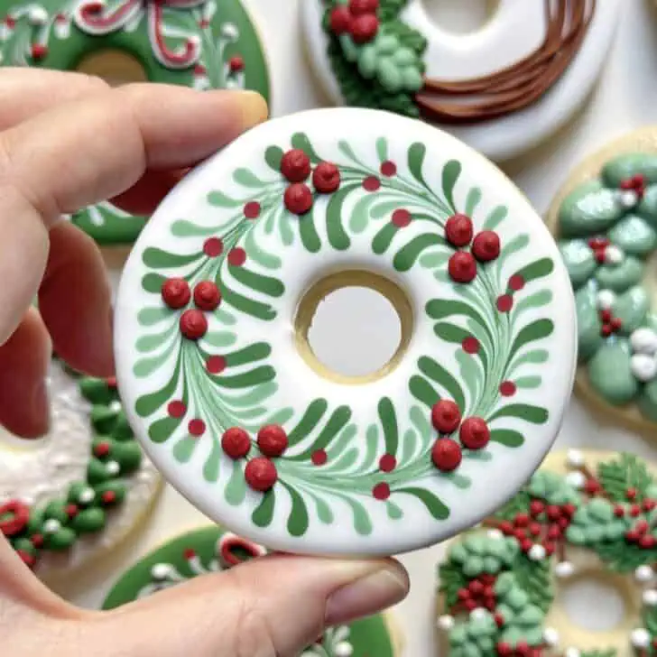 christmas wreath cookies decorated with royal icing