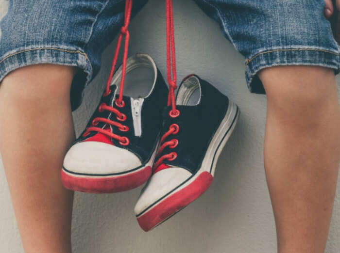 child development teaching kids how to dress themselves featured