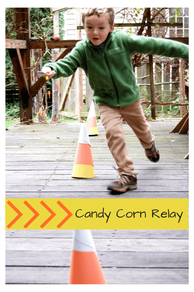 Child playing halloween activities for kids candy corn relay