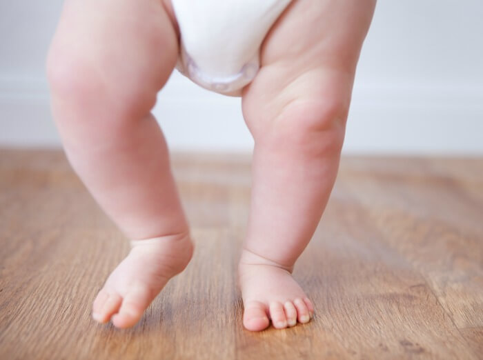 The Inspired Treehouse - Is your little one is learning to walk? Learn more and find some tips to support this important developmental skill.