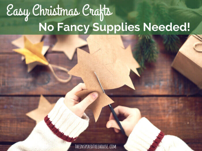 kids hands cutting out paper stars