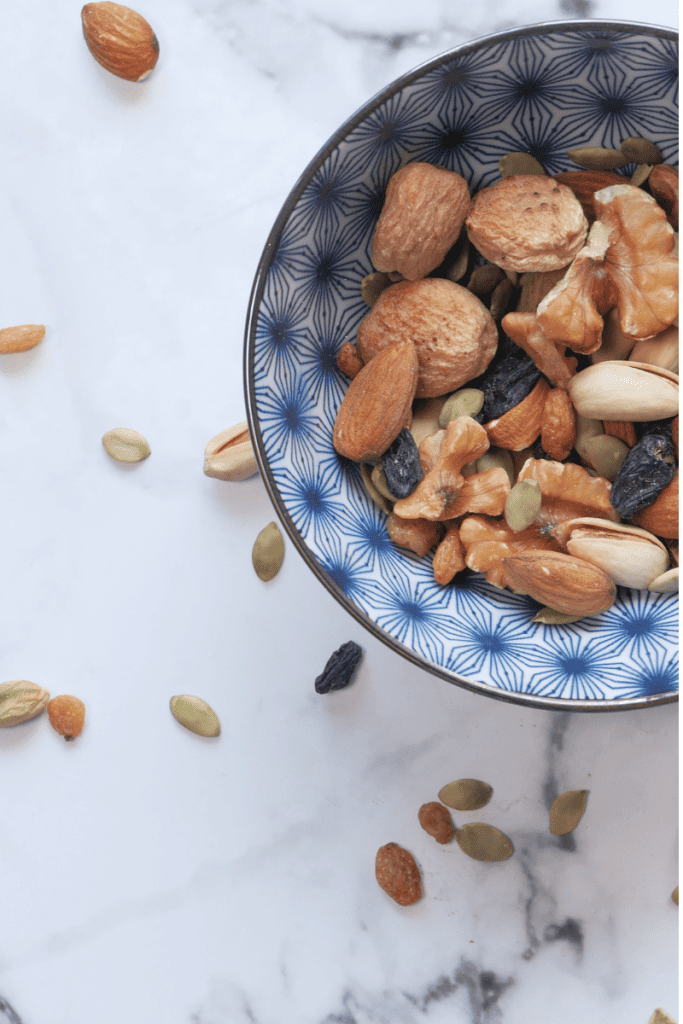 Five of the Best Blood Sugar Friendly Snacks. Bowl of mixed nuts and seeds.