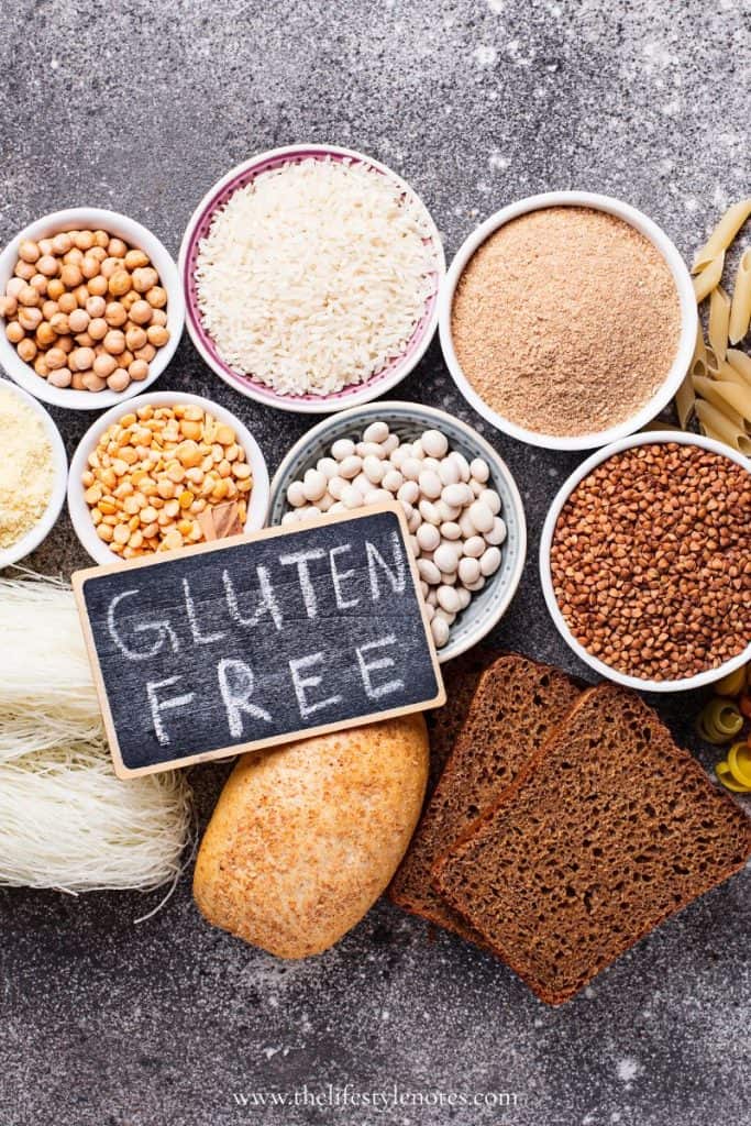 Gluten Free Guide. Bowls of gluten free grains on a table with a sign that says 'Gluten Free.'