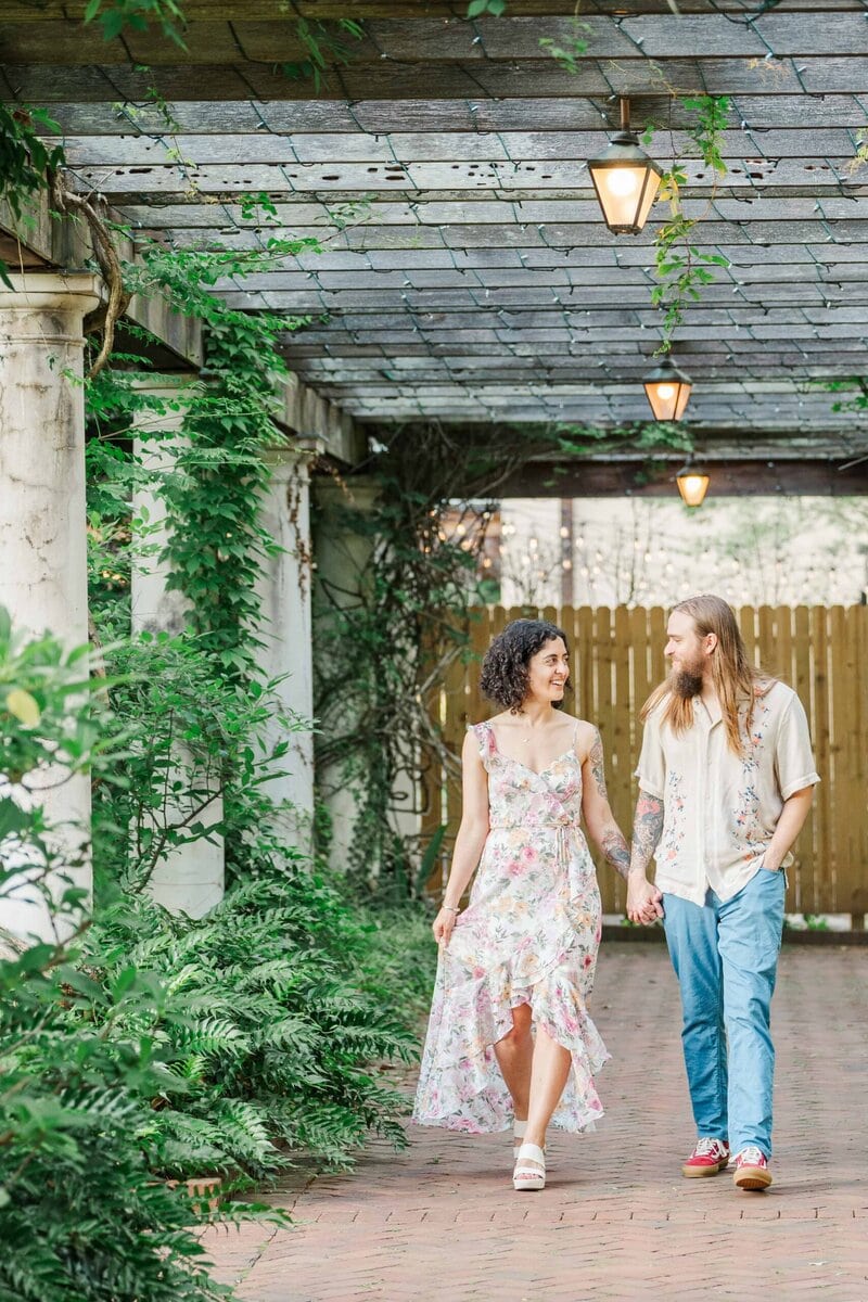 Golden hour engagement photo in the Four Seasons Garden at Daniel Stowe Conservancy