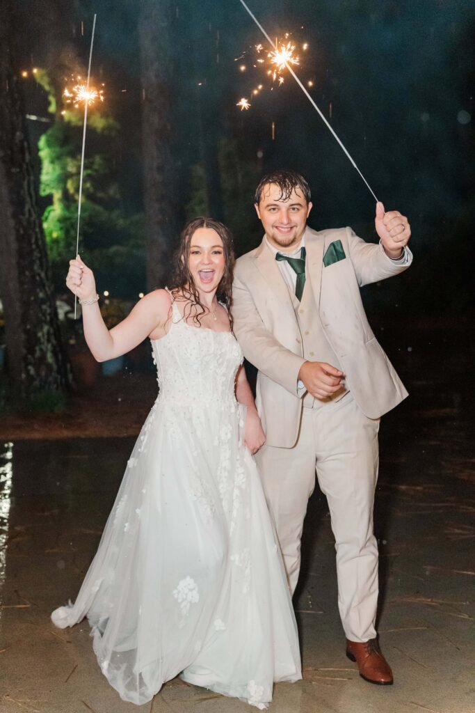 Sparkler exit in the rain at Heron Hill Venue wedding
