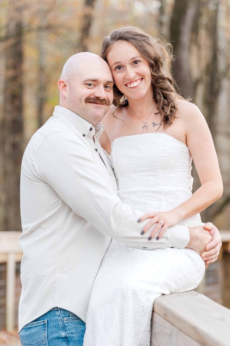 Adventurous Charlotte couple smiling during outdoor engagement photos