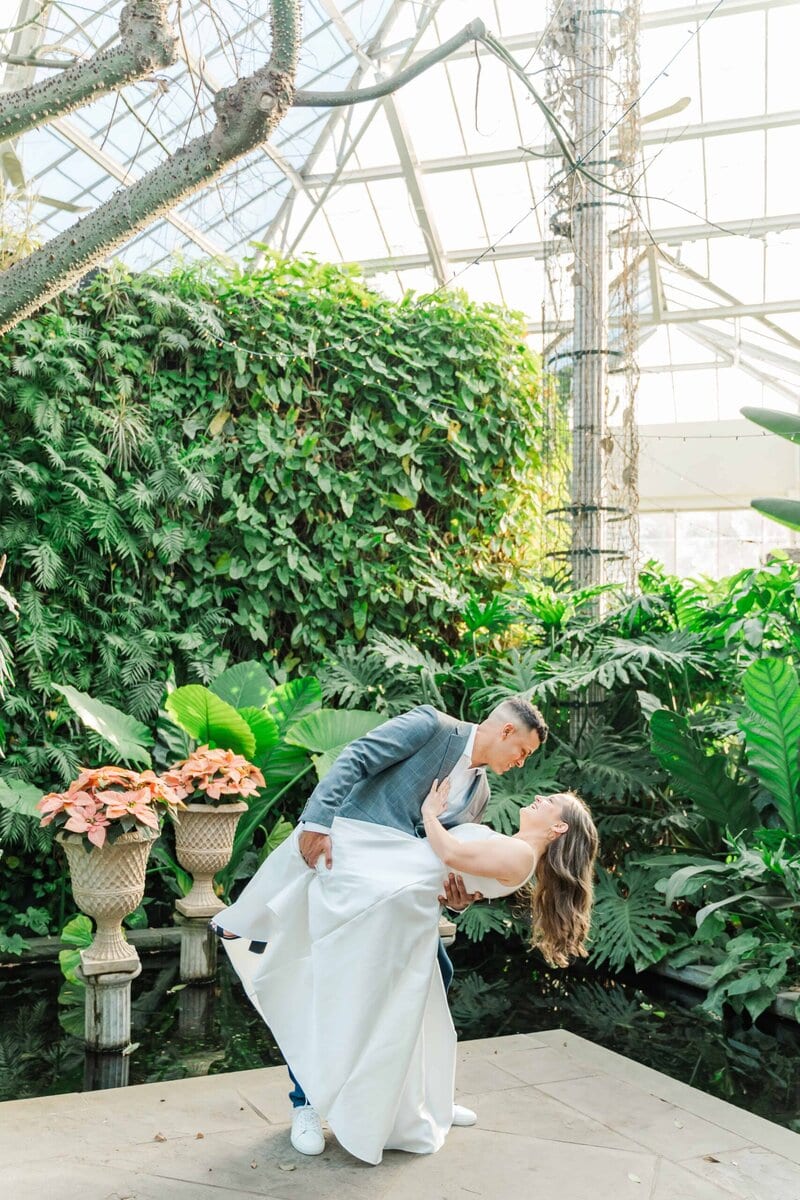 Romantic Charlotte winter engagement photos with greenery