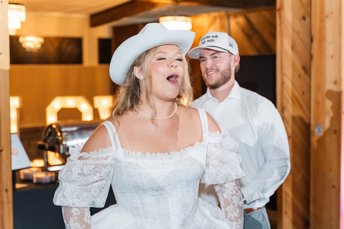 Bride and groom laughing together on the dance floor at Alexander Homestead by Wedgewood Weddings, spring wedding Charlotte NC