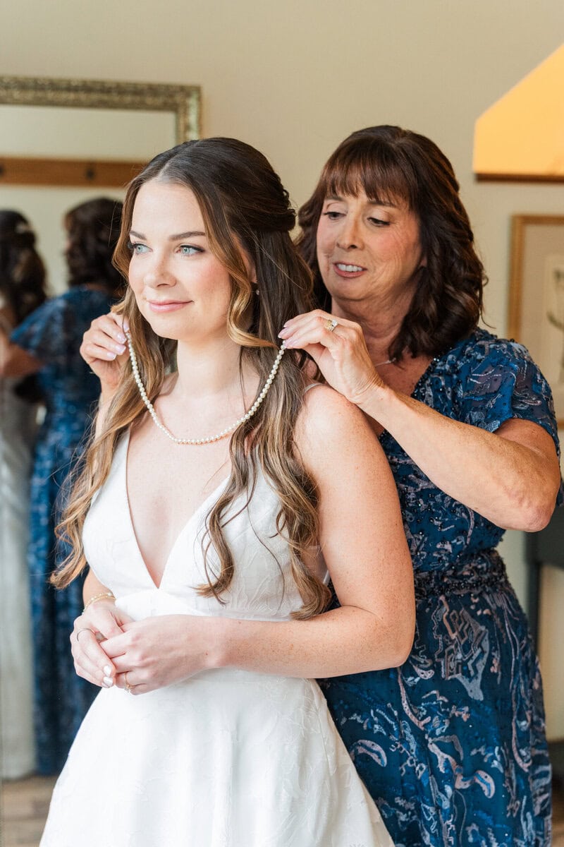 Bride getting ready in bridal suite at Alexander Homestead Charlotte NC
