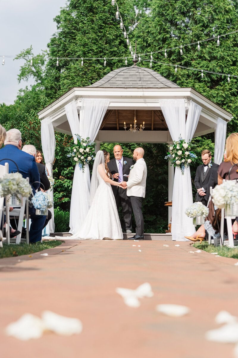 Wide shot of outdoor ceremony in the garden at Alexander Homestead Charlotte NC