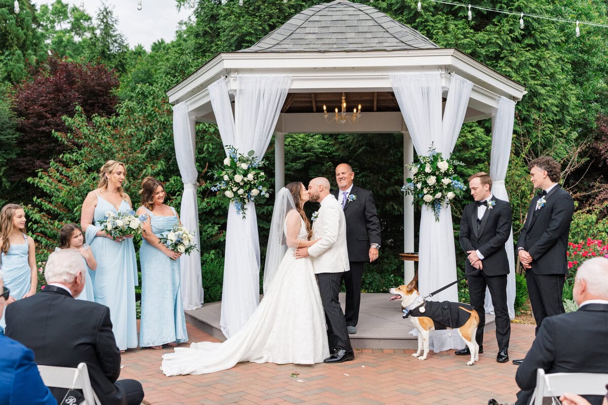 Sunny spring ceremony at Alexander Homestead wedding venue Charlotte NC