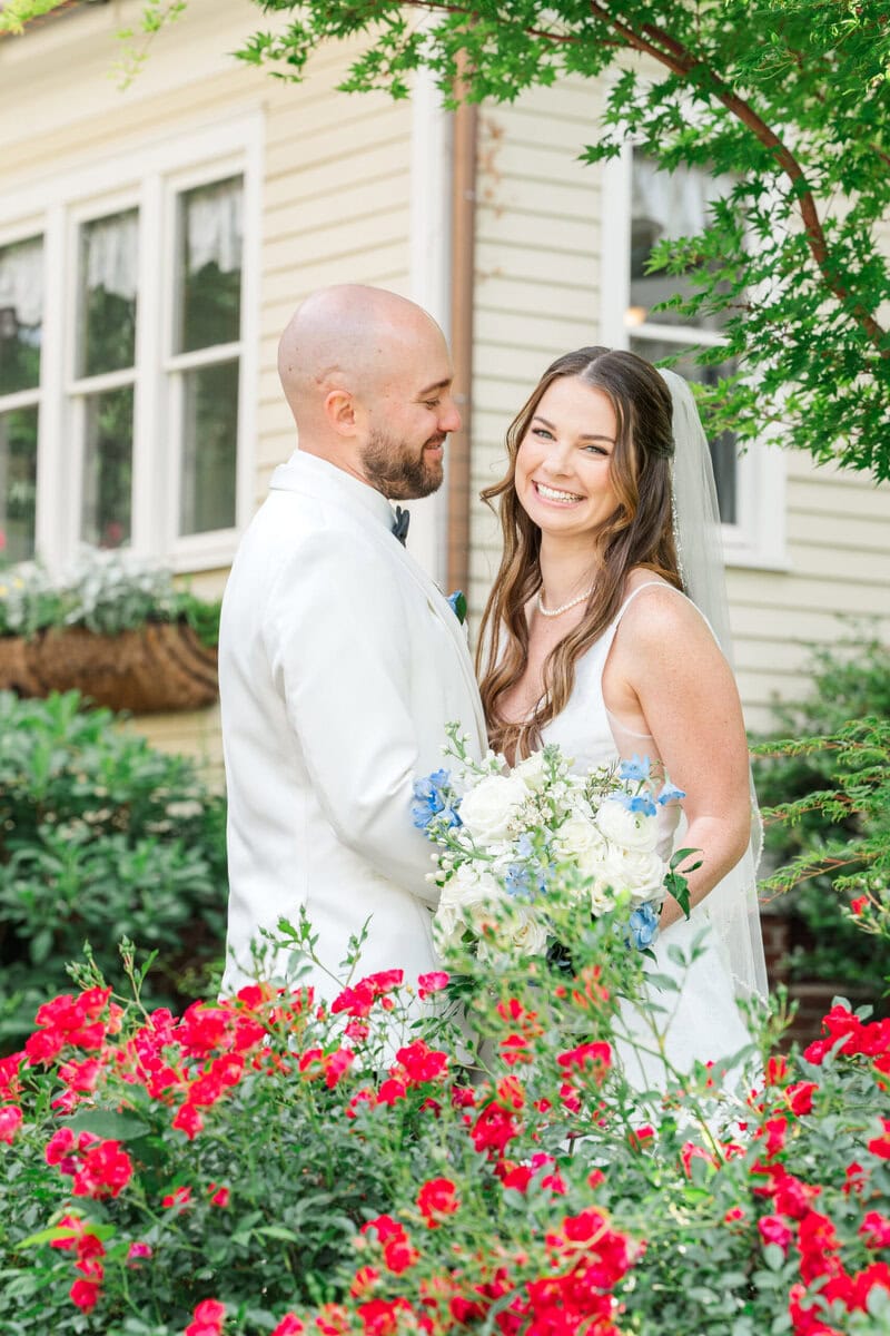 Blooming roses in the garden at Alexander Homestead spring wedding
