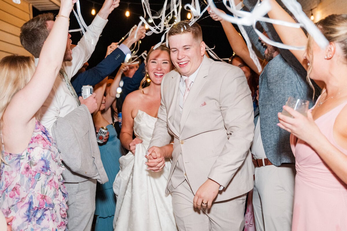 bubble and LED sparkler wedding exit Mariposa Chapel Iron Station NC rainy spring wedding