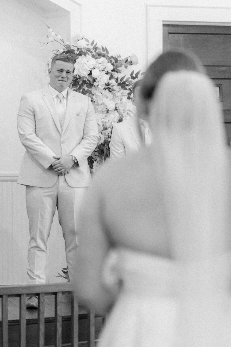 groom seeing bride at the altar Mariposa Chapel intimate chapel wedding near Charlotte NC