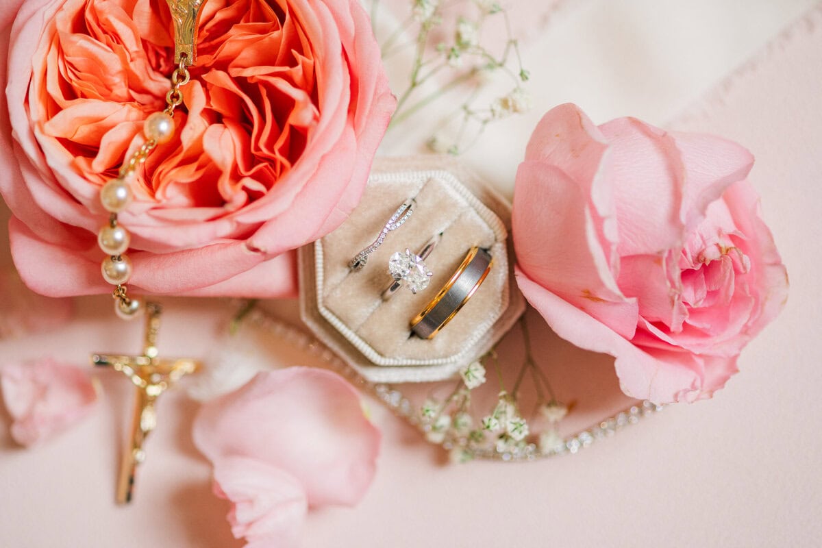 detail shot wedding florals pinks reds whites included Mariposa Chapel wedding package NC