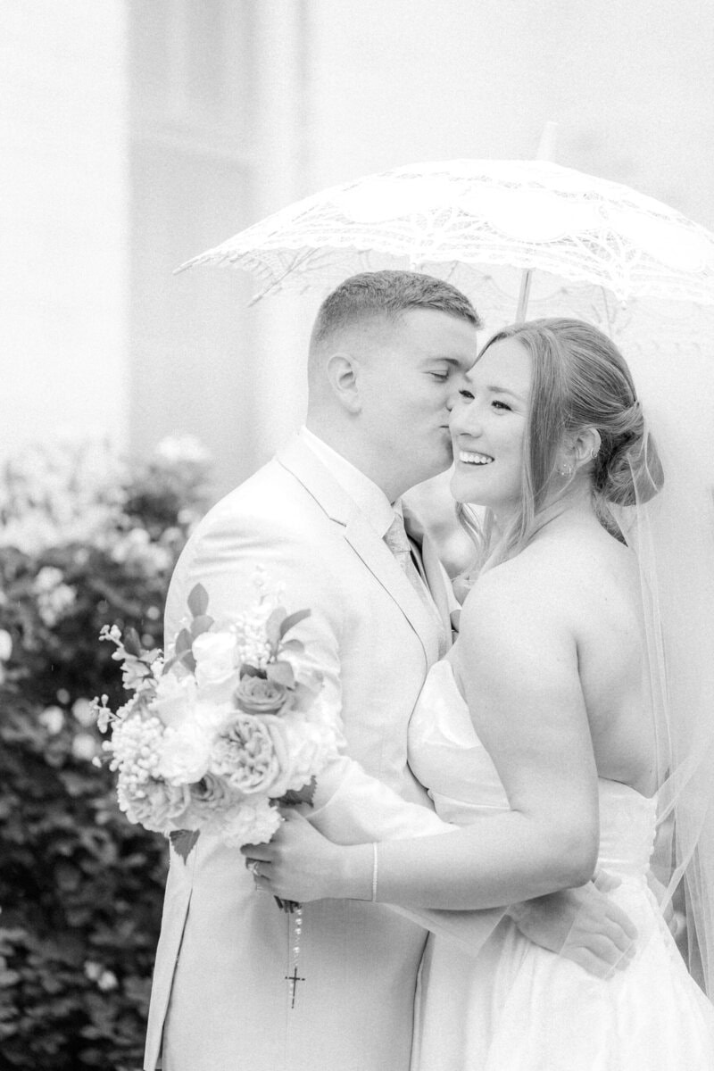 moody rainy wedding portrait bride and groom at Mariposa Chapel spring wedding Lincoln County NC