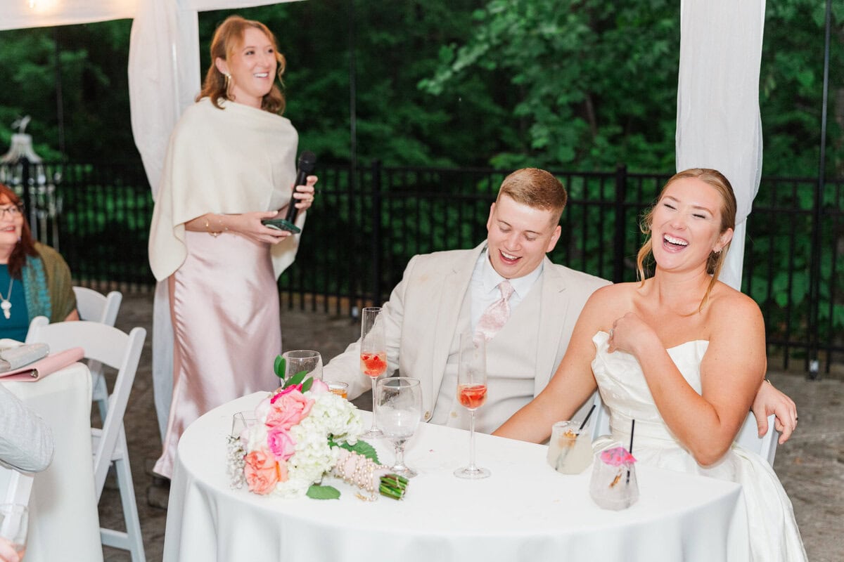 romantic tent reception decor pink red white florals Mariposa Chapel spring wedding NC