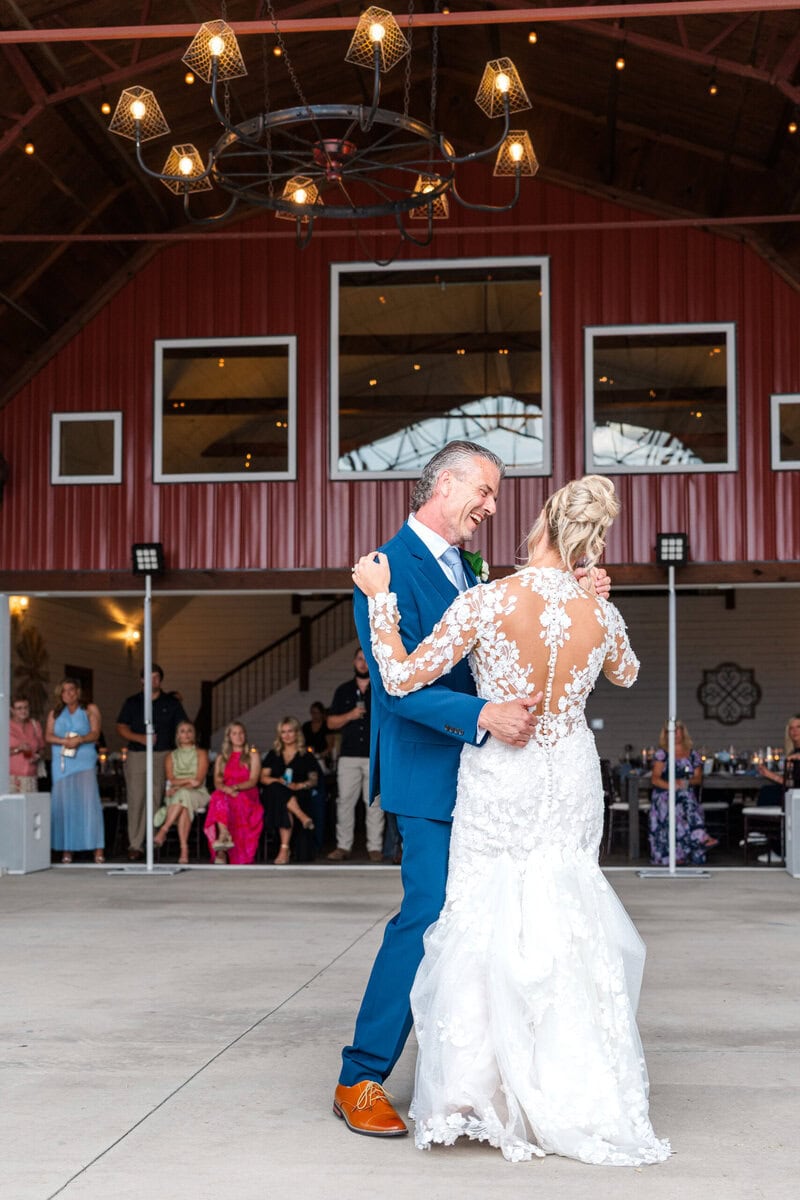 Father daughter dance under covered porch at Hidden Hill Venue Morganton NC