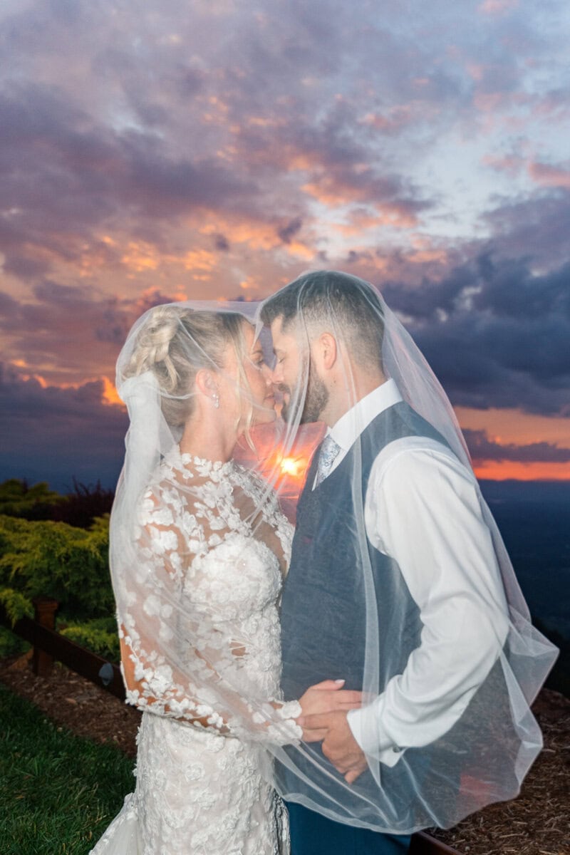 Off camera flash wedding portraits at golden hour Hidden Hill Venue Blue Ridge Mountains North Carolina