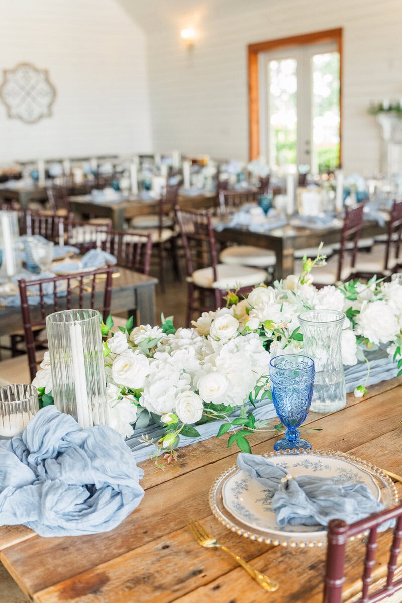 Hidden Hill Venue modern farmhouse barn interior wedding reception Morganton NC white walls chandeliers