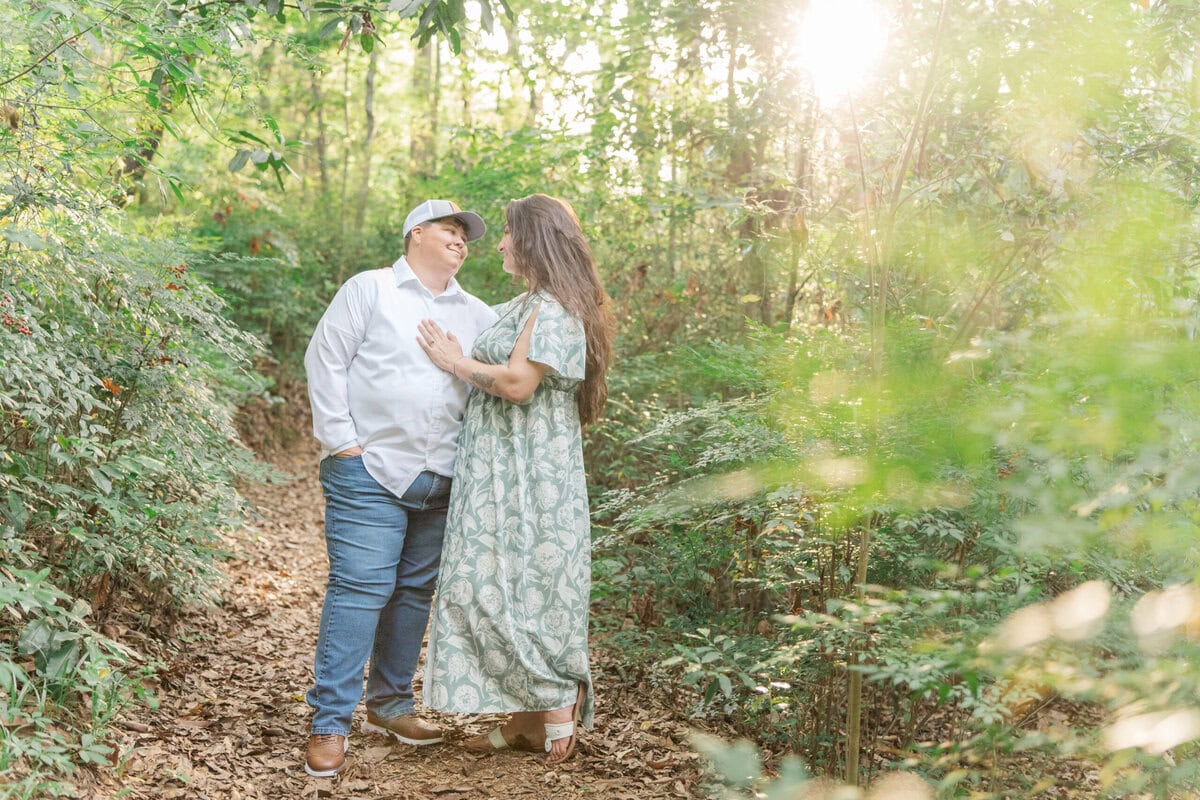 Candid moment of the couple laughing during their engagement session, LGBTQ+ wedding photographer Charlotte NC