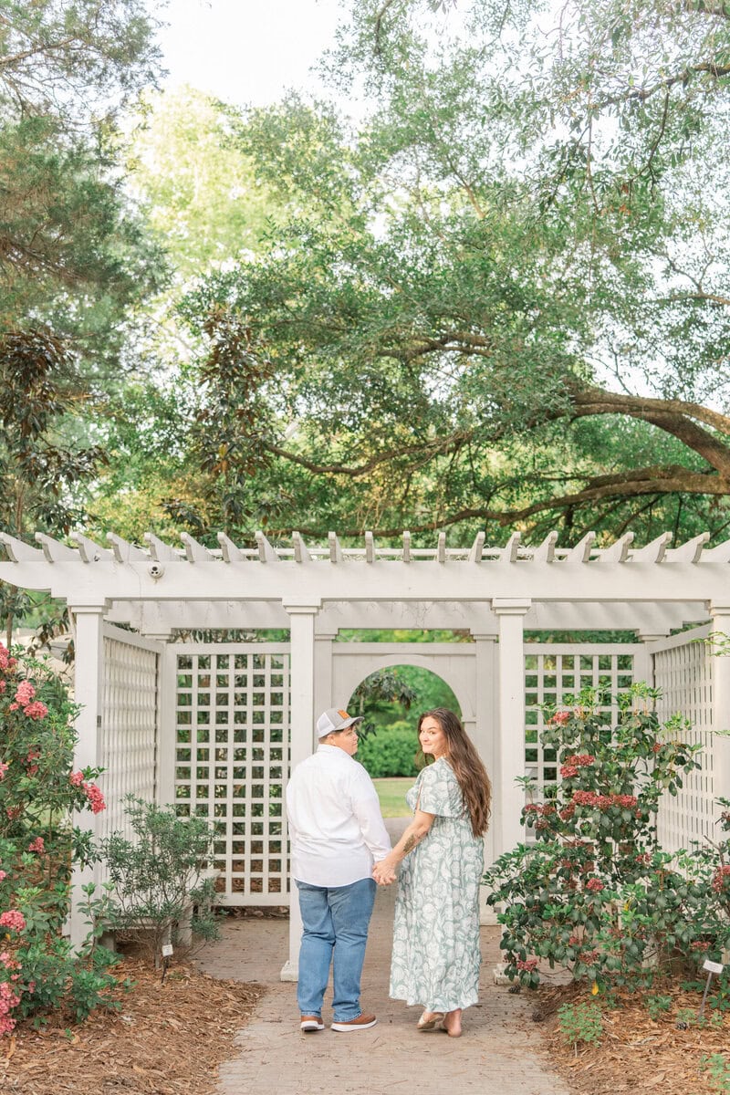 Nikki and Ashley sharing a quiet, intimate moment away from the crowds at Kamila Gardens