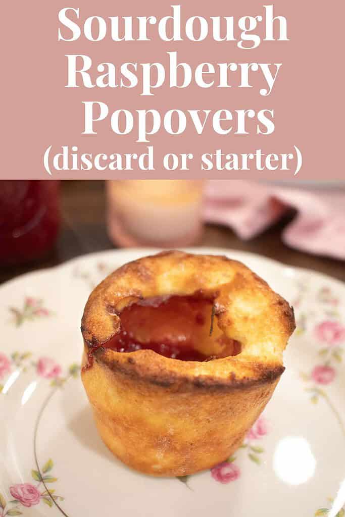 a pinterest pin with text on top that reads Sourdough Raspberry Popovers (discard or starter) and a image on the bottom of a raspberry popover on a pink floral china plate