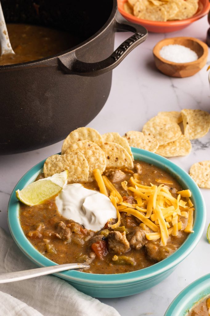 Pork green chili cooked in a Smithey Dutch oven.
